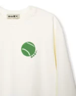 Bluza męska MOMU, kremowa, zielony haft piłeczki — zbliżenie haftu